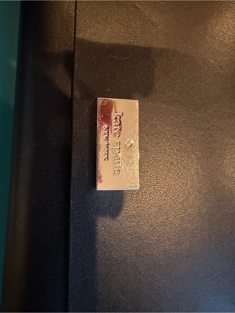Kate Spade black billfold.